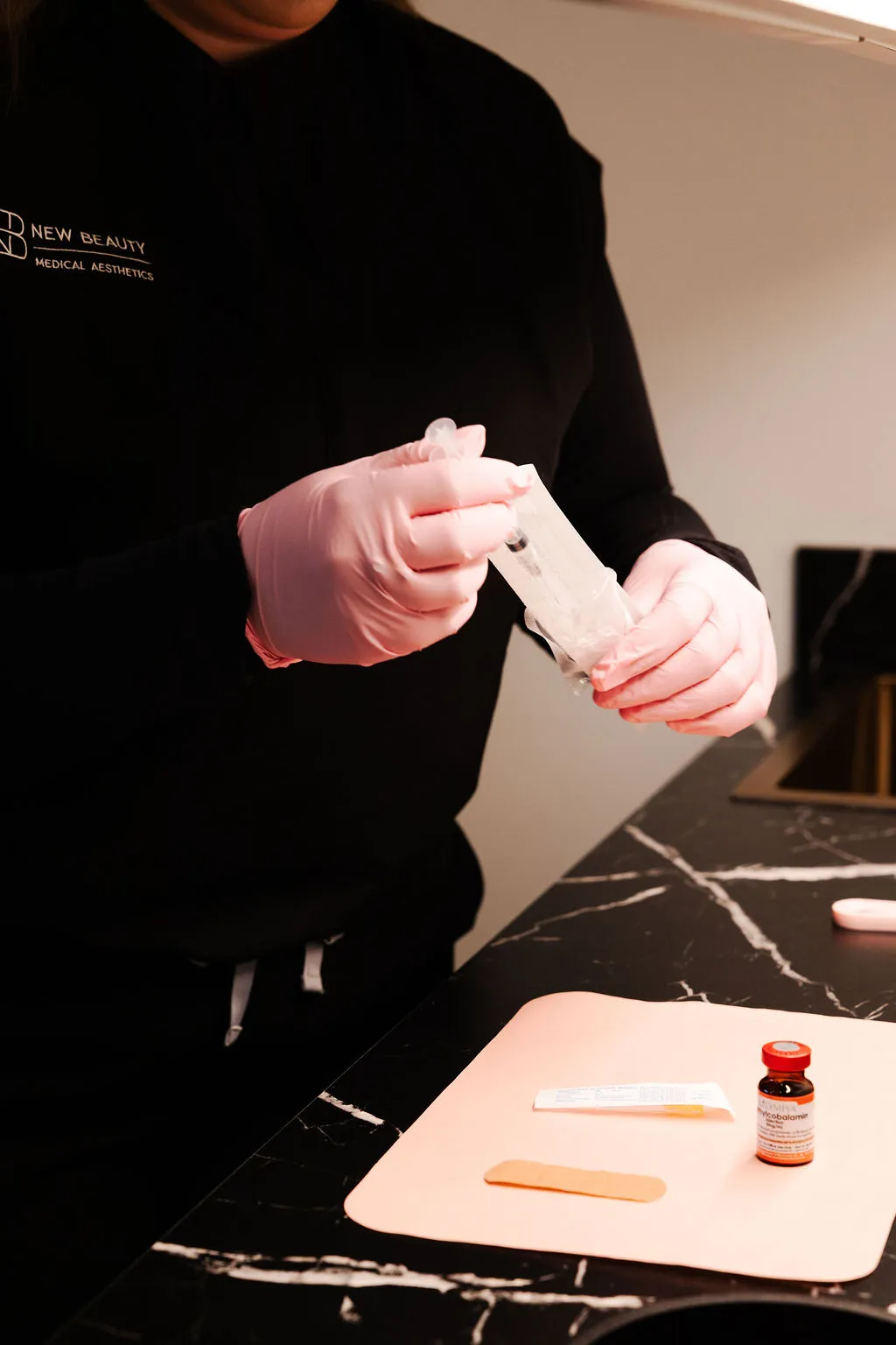 Medical professional arranging equipment in a sterile environment for Botox treatments